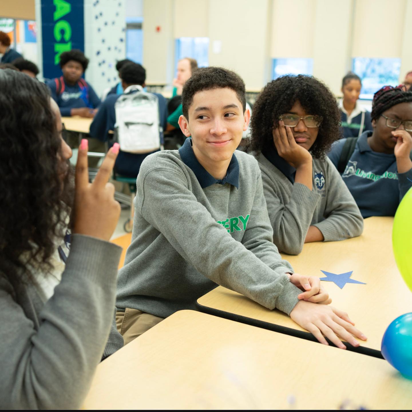 Students posing together and participating in school activities